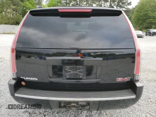 2014 GMC Yukon Denali z VIN 1GKS1EEF4ER130225, wystawiony jako Copart lot #53042185 z przebiegiem Nie podano mil oraz Szkody całkowita. Historia ofert i sprzedaży dostępna na DreamBid. Obrazek 6.