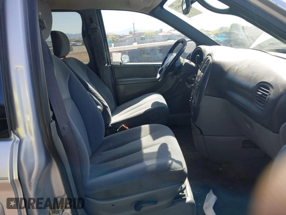 2005 Dodge Caravan SXT with VIN 2D4GP44L85R100434, listed as a IAAI auction lot 42099575 with 220,424 mi miles and . Bid and sale history available at DreamBid. Image 5.