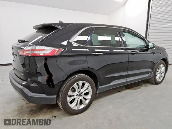 2021 Ford Edge Titanium с VIN 2FMPK4K94MBA27083, выставлен на аукционе Copart как лот 62149285 с пробегом 128 325 миль миль и Чистый • Clean title. История ставок и продаж доступна на DreamBid. Изображение 3.