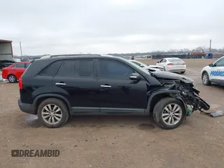 2011 Kia Sorento EX with VIN 5XYKU4A13BG057477, listed as a IAAI auction lot 41512528 with 127,923 mi miles. Bid and sale history available at carsss.com. Image 13.