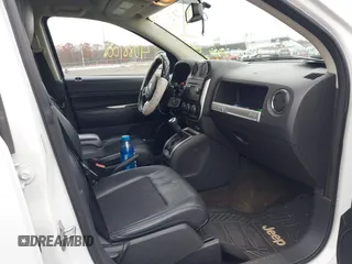 2016 Jeep Compass Latitude with VIN 1C4NJCEA3GD735161, listed as a IAAI auction lot 40881008 with 126,384 mi miles. Bid and sale history available at carsss.com. Image 5.