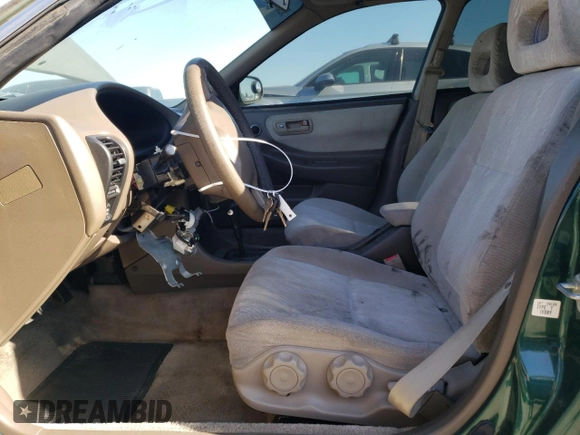 1999 Acura Integra LS with VIN JH4DB7657XS001635, listed as a Copart auction lot 42742925 with 157,447 mi miles and Clean title. Bid and sale history available at DreamBid. Image 7.