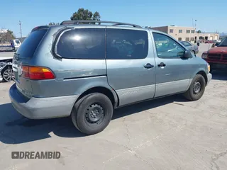 1999 Toyota Sienna LE with VIN 4T3ZF13C1XU097653, listed as a IAAI auction lot 41765274 with 236,625 mi miles. Bid and sale history available at carsss.com. Image 4.