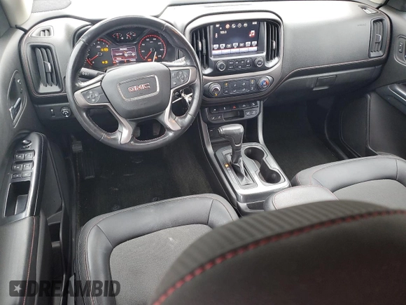 2016 GMC Canyon 4WD SLE with VIN 1GTG6CE36G1374456, listed as a Copart auction lot 52864115 with 63,892 mi miles and Salvage title. Bid and sale history available at DreamBid. Image 8.