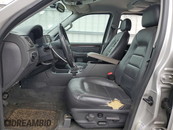 2004 Ford Explorer Limited z VIN 1FMDU75W94ZA68418, wystawiony jako Copart lot #65062085 z przebiegiem 157 972 mil mil oraz Szkoda całkowita • Salvage title. Historia ofert i sprzedaży dostępna na DreamBid. Obrazek 7.