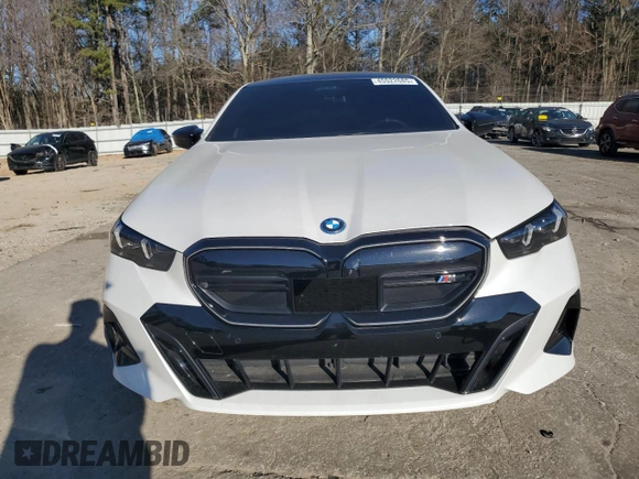 2024 BMW i5 M60 with VIN WBY43FK00RCP86174, listed as a Copart auction lot 45522685 with 7,392 mi miles and Salvage title. Bid and sale history available at DreamBid. Image 5.