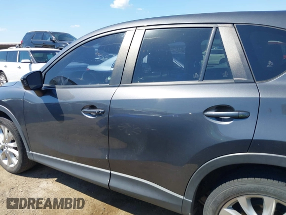2014 Mazda CX-5 Grand Touring with VIN JM3KE2DY8E0383206, listed as a IAAI auction lot 40205756 with 120,231 mi miles. Bid and sale history available at carsss.com. Image 14.