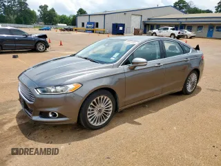 2014 Ford Fusion Titanium Hybrid with VIN 3FA6P0RU2ER158302, listed as a Copart auction lot 59049995 with 108,571 mi miles and Salvage title. Bid and sale history available at DreamBid. Image 1.