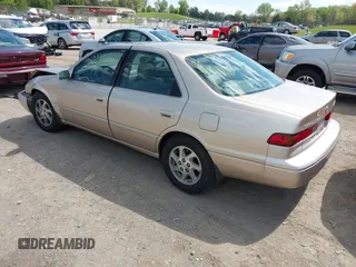 1999 Toyota Camry LE z VIN JT2BF28K9X0201679, wystawiony jako IAAI lot #42037008 z przebiegiem 107 928 mil mil oraz . Historia ofert i sprzedaży dostępna na DreamBid. Obrazek 3.