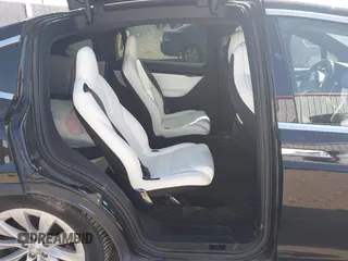 2019 Tesla Model X 75D with VIN 5YJXCBE22KF184504, listed as a IAAI auction lot 41802023 with 137,094 mi miles. Bid and sale history available at carsss.com. Image 8.