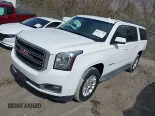 2016 GMC Yukon XL SLE with VIN 1GKS1FKC0GR331459, listed as a IAAI auction lot 41557718 with 203,803 mi miles. Bid and sale history available at carsss.com. Image 2.