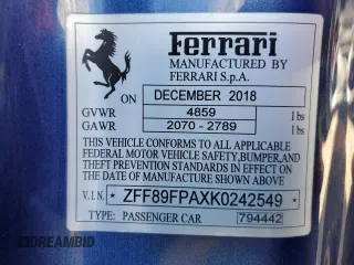 2019 Ferrari Portofino z VIN ZFF89FPAXK0242549, wystawiony jako Copart lot #74454234 z przebiegiem Nie podano mil oraz Nie do naprawy. Historia ofert i sprzedaży dostępna na DreamBid. Obrazek 13.