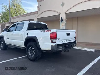2017 Toyota Tacoma SR5 with VIN 5TFCZ5AN1HX116613, listed as a Copart auction lot 54272925 with 196,385 mi miles and Clean Title. Bid and sale history available at DreamBid. Image 3.