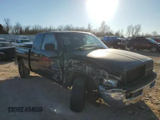 1999 Dodge 1500 with VIN 3B7HC12Y1XG199438, listed as a Copart auction lot 88346955 with 230,867 mi miles and Salvage Title. Bid and sale history available at DreamBid. Image 4.