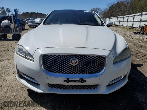 2016 Jaguar XJ Portfolio with VIN SAJWA2G70G8W01136, listed as a Copart auction lot 50120455 with 92,224 mi miles and Salvage title. Bid and sale history available at DreamBid. Image 5.