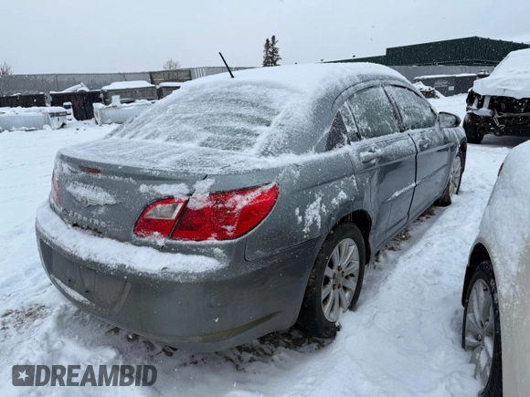 2010 Chrysler Sebring Touring with VIN 1C3CC4FB1AN135341, listed as a Copart auction lot 82492404 with Not Provided miles and Salvage Title. Bid and sale history available at carsss.com. Image 3.