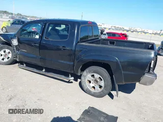 2008 Toyota Tacoma PreRunner with VIN 3TMJU62N38M059962, listed as a IAAI auction lot 41426524 with 187,720 mi miles. Bid and sale history available at carsss.com. Image 3.