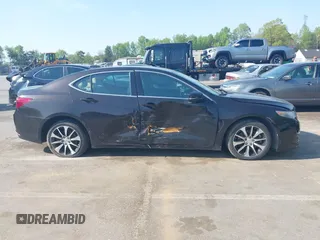 2015 Acura TLX z VIN 19UUB1F34FA022686, wystawiony jako IAAI lot #41975685 z przebiegiem 144 503 mil mil oraz . Historia ofert i sprzedaży dostępna na DreamBid. Obrazek 13.