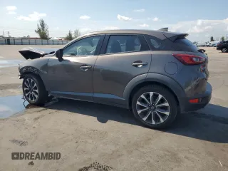 2019 Mazda CX-3 Touring z VIN JM1DKDC73K1406427, wystawiony jako Copart lot #57946715 z przebiegiem 71 838 mil mil oraz Szkody całkowita. Historia ofert i sprzedaży dostępna na DreamBid. Obrazek 2.