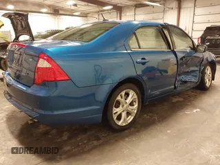 2012 Ford Fusion SE z VIN 3FAHP0HA8CR420451, wystawiony jako IAAI lot #42078163 z przebiegiem 131 049 mil mil oraz . Historia ofert i sprzedaży dostępna na DreamBid. Obrazek 4.