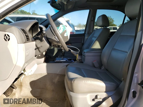 2007 Kia Sorento LX z VIN KNDJD736975696498, wystawiony jako Copart lot #85933984 z przebiegiem 116 434 mil mil oraz Szkoda całkowita • Salvage title. Historia ofert i sprzedaży dostępna na DreamBid. Obrazek 7.