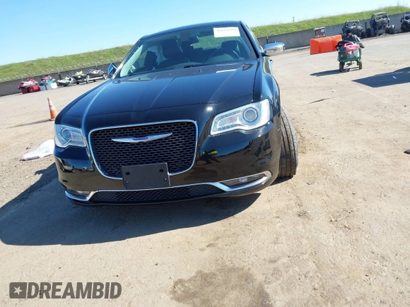 2019 Chrysler 300 Limited with VIN 2C3CCAKG8KH610865, listed as a IAAI auction lot 41668294 with 121,656 mi miles. Bid and sale history available at carsss.com. Image 12.