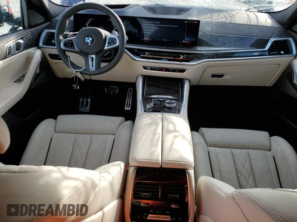 2025 BMW X6 M60i with VIN 5UX43EX01S9X19069, listed as a Copart auction lot 42613105 with 6,909 mi miles and Salvage Title. Bid and sale history available at carsss.com. Image 8.