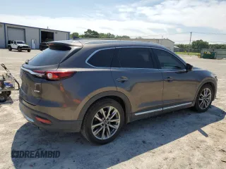 2018 Mazda CX-9 Grand Touring with VIN JM3TCADY1J0212568, listed as a Copart auction lot 60195385 with 151,099 mi miles and Salvage title. Bid and sale history available at DreamBid. Image 3.