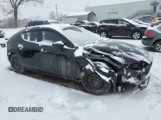 2023 Mazda 3 S Carbon Edition with VIN JM1BPBLM1P1614736, listed as a Copart auction lot 46285155 with 56,830 mi miles and Salvage Title. Bid and sale history available at DreamBid. Image 4.