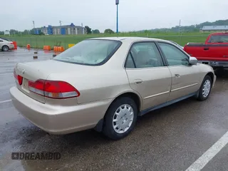 2002 Honda Accord LX z VIN JHMCG56402C025464, wystawiony jako IAAI lot #42458693 z przebiegiem 257 711 mil mil oraz . Historia ofert i sprzedaży dostępna na DreamBid. Obrazek 4.