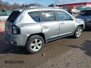 2016 Jeep Compass Latitude with VIN 1C4NJDEB5GD713905, listed as a IAAI auction lot 41138023 with 107,479 mi miles and . Bid and sale history available at DreamBid. Image 4.