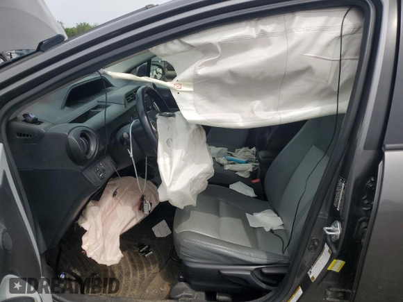 2014 Toyota Prius One z VIN JTDKDTB33E1066355, wystawiony jako Copart lot #58524285 z przebiegiem Nie podano mil oraz Szkoda całkowita • Salvage title. Historia ofert i sprzedaży dostępna na DreamBid. Obrazek 7.