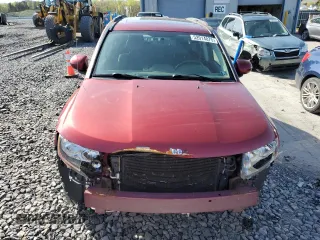 2016 Jeep Compass High Altitude Edition with VIN 1C4NJDEB0GD729476, listed as a Copart auction lot 52014075 with 144,978 mi miles and Salvage Title. Bid and sale history available at carsss.com. Image 5.