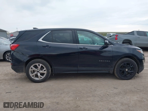 2020 Chevrolet Equinox LT z VIN 2GNAXKEV3L6100175, wystawiony jako IAAI lot #42151713 z przebiegiem 56 603 mil mil oraz . Historia ofert i sprzedaży dostępna na DreamBid. Obrazek 13.