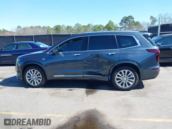 2021 Cadillac XT6 Premium Luxury with VIN 1GYKPERS0MZ110029, listed as a IAAI auction lot 41669104 with 58,890 mi miles and . Bid and sale history available at DreamBid. Image 14.