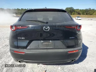 2020 Mazda CX-30 Premium with VIN 3MVDMAEM4LM137806, listed as a Copart auction lot 76620304 with 65,071 mi miles and Salvage title. Bid and sale history available at DreamBid. Image 6.