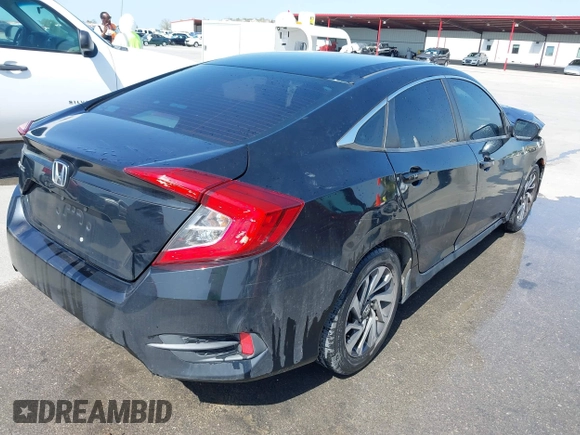 2016 Honda Civic Sedan EX with VIN 19XFC2F74GE070202, listed as a IAAI auction lot 41925477 with 148,453 mi miles. Bid and sale history available at carsss.com. Image 4.