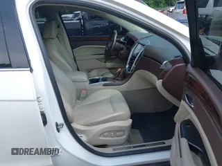 2014 Cadillac SRX Performance Collection with VIN 3GYFNFE34ES677712, listed as a IAAI auction lot 42668059 with 150,135 mi miles and . Bid and sale history available at DreamBid. Image 5.