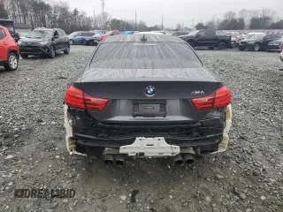 2015 BMW M4 with VIN WBS3R9C54FK330180, listed as a Copart auction lot 40706044 with 69,474 mi miles. Bid and sale history available at carsss.com. Image 6.