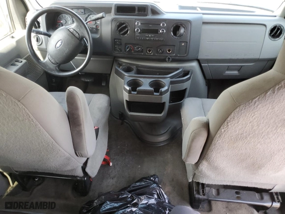 2014 Ford Econoline Wagon XL with VIN 1FBNE3BLXEDA14976, listed as a Copart auction lot 65948404 with 285,655 mi miles and Salvage Title. Bid and sale history available at carsss.com. Image 8.