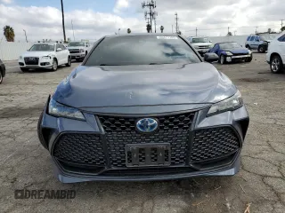 2019 Toyota Avalon Limited Hybrid z VIN 4T1B21FB3KU003922, wystawiony jako Copart lot #69477182 z przebiegiem 57 921 mil mil oraz . Historia ofert i sprzedaży dostępna na DreamBid. Obrazek 5.