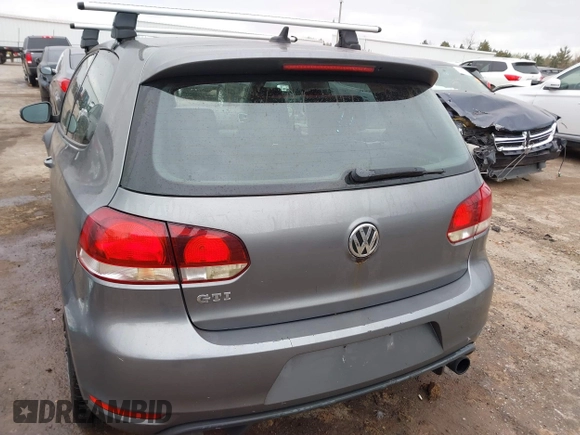 2013 Volkswagen GTI w/Conv & Sunroof z VIN WVWFD7AJ1DW053839, wystawiony jako IAAI lot #41805068 z przebiegiem 90 501 mil mil oraz . Historia ofert i sprzedaży dostępna na DreamBid. Obrazek 16.