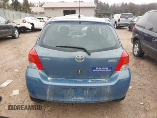 2009 Toyota Yaris with VIN JTDKT903195255240, listed as a IAAI auction lot 41650800 with 168,991 mi miles. Bid and sale history available at carsss.com. Image 16.