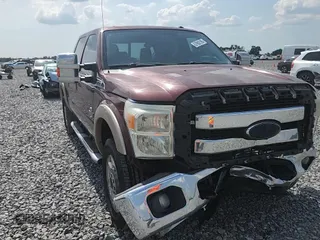 2012 Ford F-250 XL z VIN 1FT7W2BT0CEB77042, wystawiony jako Copart lot #57882195 z przebiegiem 141 574 mil mil oraz Szkoda całkowita • Salvage title. Historia ofert i sprzedaży dostępna na DreamBid. Obrazek 13.