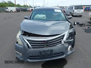 2015 Nissan Altima SV with VIN 1N4AL3AP3FC569706, listed as a IAAI auction lot 41820987 with 169,338 mi miles and . Bid and sale history available at DreamBid. Image 13.