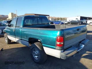 1999 Dodge Ram 2500 with VIN 3B7KC23Z5XG118959, listed as a IAAI auction lot 40484594 with 176,946 mi miles. Bid and sale history available at carsss.com. Image 3.