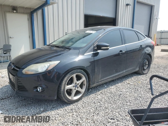 2014 Ford Focus Titanium with VIN 1FADP3J20EL347435, listed as a Copart auction lot 54947345 with 144,169 mi miles and Salvage title. Bid and sale history available at DreamBid. Image 1.