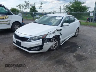 2013 Kia Optima LX z VIN KNAGM4A79D5312328, wystawiony jako IAAI lot #42356029 z przebiegiem 194 562 mil mil oraz . Historia ofert i sprzedaży dostępna na DreamBid. Obrazek 2.