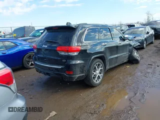 2019 Jeep Grand Cherokee Overland with VIN 1C4RJFCGXKC688543, listed as a IAAI auction lot 41643678 with 65,182 mi miles. Bid and sale history available at carsss.com. Image 4.