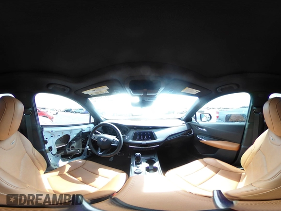 2022 Cadillac XT4 FWD Sport with VIN 1GYFZER44NF164899, listed as a IAAI auction lot 42152554 with 8,058 mi miles and . Bid and sale history available at DreamBid. Image 19.